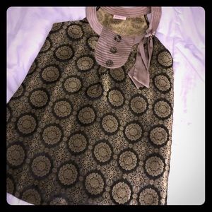 Women’s size Medium gold blouse.